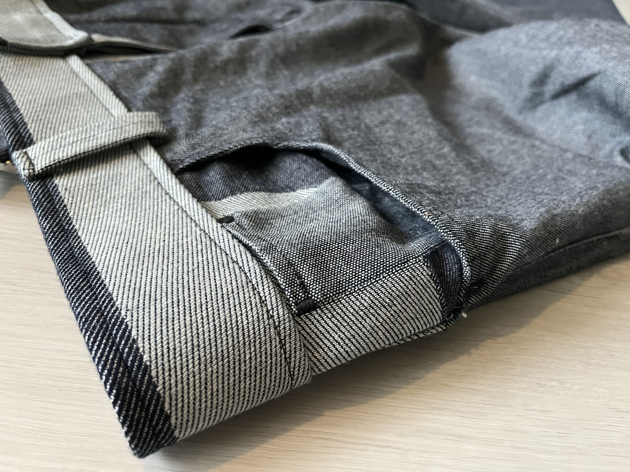 Fifth pocket, woven in place